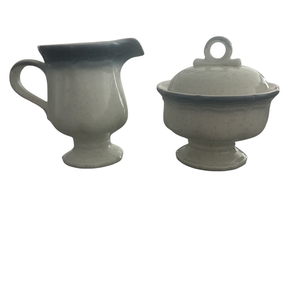 Mikasa cream and gray speckled creamer and covered sugar bowl